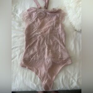 Brand new with tags!! Free people Elegant Pink Lace Bodysuit